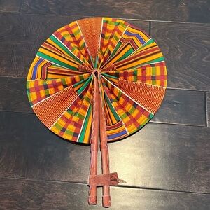African folding leather fan